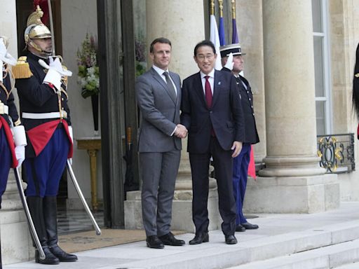 France and Japan agree to start talks on military cooperation deal