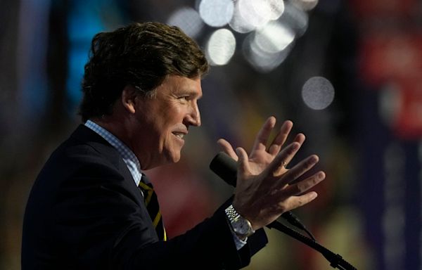 Tucker Carlson briefly overtakes Joe Rogan for top Spotify podcast