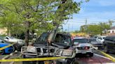 SUV snaps pole in New Dorp crash; 1 taken to hospital