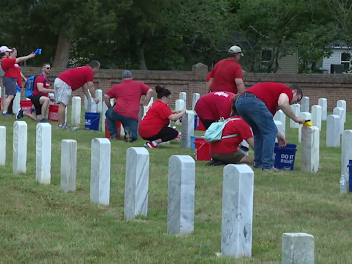 Keller Williams honors fallen soldiers on Red Day with cemetery clean-up event