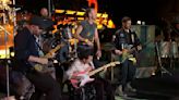 Michael J. Fox plays guitar onstage with Coldplay during their Glastonbury headline set