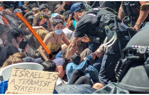 Riot police drag away protesters at University of Texas as Gaza tensions flare