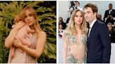 Suki Waterhouse poses with her and Robert Pattinson's baby daughter for new magazine cover