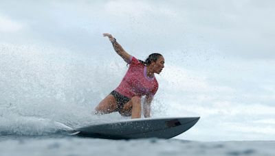 Surfing-Reigning champion Moore just 'stoked' to be a surfer after epic day in Tahiti