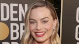 Margot Robbie Makes a Hot Pink Entrance as Barbie on Film Set