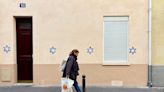 France probes possible foreign link to Star of David graffiti in Paris