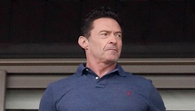 Hugh Jackman nurses injured finger in Brazil