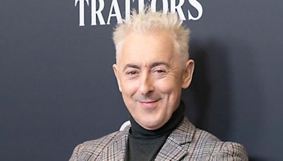 Alan Cumming’s Traitors Season 3 Outfits Match the Show’s Missions