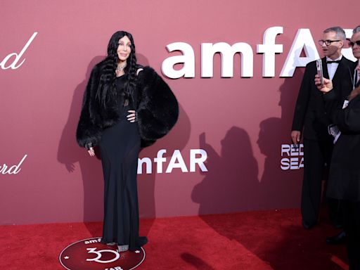 Cher turns back time, with Nick Jonas, Demi Moore, at amfAR Cannes Gala