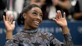 Biles and Team USA mix glamour and grit to surge to the lead at Olympic gymnastics qualifying