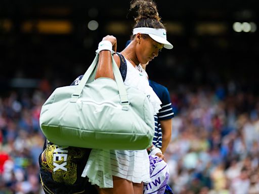 Naomi Osaka fights back tears after defeat to Emma Navarro