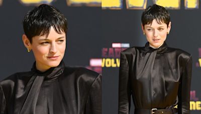 Emma Corrin Favors Bold Shoulders in Satin Saint Laurent Dress for ‘Deadpool & Wolverine’ Fan Event in Berlin