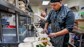 Three months after catastrophic floods, these community groups are still cooking meals for displaced families