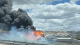 Interstate near Arizona-New Mexico line reopens after train derailment as lingering fuel burns off