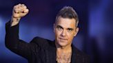 Robbie Williams Randomly Picks Fan From Audience He Chose 20 Years Ago: 'Nice to See You Again'