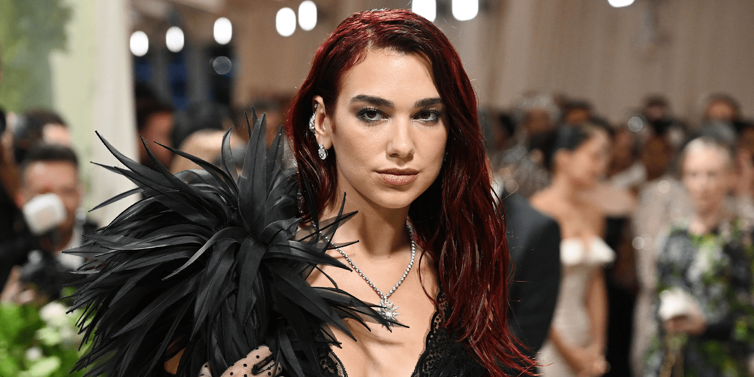 Dua Lipa Paired Her Crystal-Encrusted Crop Top With Fishnet Gloves at the Met Gala After-Party