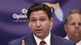 Ron DeSantis defended leaflets given to migrants he sent to Martha's Vineyard which promised them cash and jobs