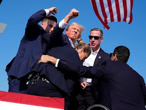Trump rushed off stage by Secret Service as bangs heard at Pennsylvania rally