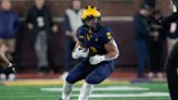 Michigan star Corum says he had no business with Stalions, unaware of online records in his name