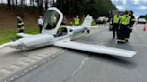 Small plane clips 2 vehicles as it lands on North Carolina highway, but no injuries are reported