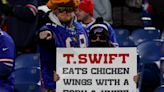 Taylor Swift head cutout burned in dumpster fire by Bills fan before Chiefs playoff game