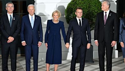 Macron and Jill Biden hold hands ahead of Nato summit