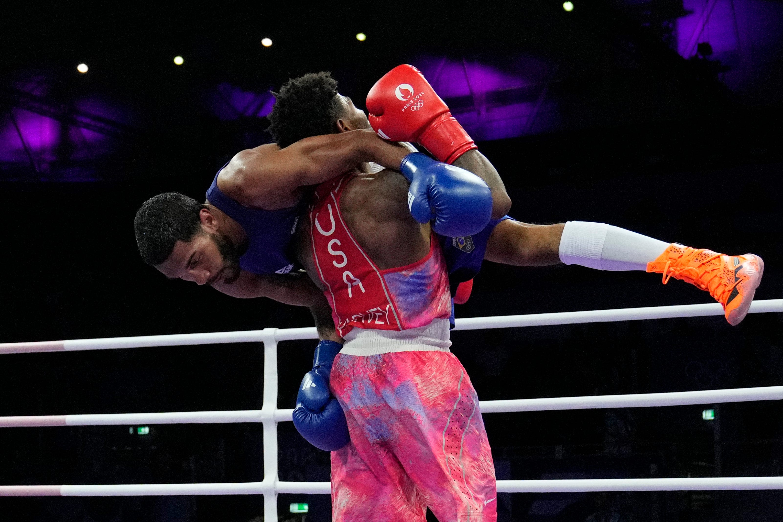 US boxer trailed on Olympic judges' scorecards entering final round. How he advanced
