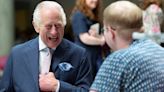 King Charles is all smiles during public return at cancer treatment center