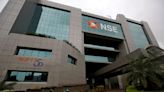 Indian shares end marginally up after choppy session as banks gain