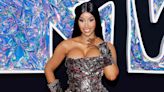 Cardi B Takes Glam to the Next Level in Gown and Arm Cuffs Covered in Hair Clips at the 2023 VMAs