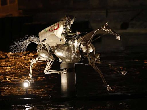 Watch a mesmerizing metal horse gallop down Seine River