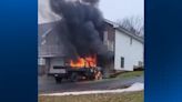 Neighbor springs into action when truck bursts into flames near McDonald home