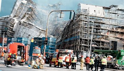 Firefighters to tackle scaffolding dangling outside ruins of fire-ravaged Danish landmark