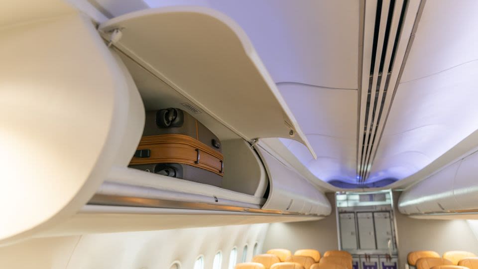 An airplane passenger was spotted in an overhead bin. Here’s why that’s a terrible idea