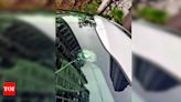 Crack in Windshield Sparks Gunshot Fears in Noida Condo | Noida News - Times of India