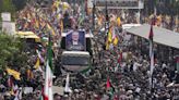 Iran’s supreme leader prays over the coffin of Hamas leader Haniyeh, whose killing risks a wider war