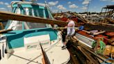 Residents clean up after tornadoes, storms ripped through Michigan