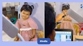 Adorable little girl's Aadhar card photo session in viral video melts hearts online