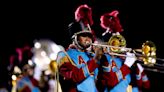 'We touched his heart': Austin-East Marching Roadrunners get a $30,000 check from admirer