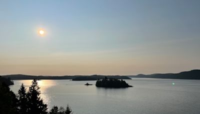 Raging fires cast a smoky pall over Eastern Canada’s clear skies