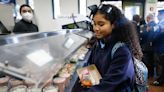 8 US states offer free lunch for students. Here's how they pay for it, from a 4% millionaire's tax to a $0.03 property tax rate increase.