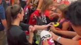 Caitlin Clark swats away autograph seeker at All-Star weekend