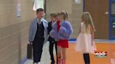 Young boy inspires fellow students to look their best for Dapper Day