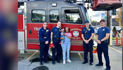 Little girl celebrates 1st birthday with firefighters who helped save her at birth