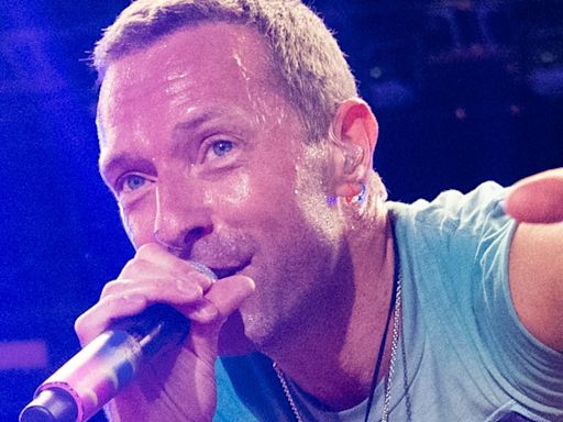 Dakota Johnson proudly watches Chris Martin perform at Glastonbury