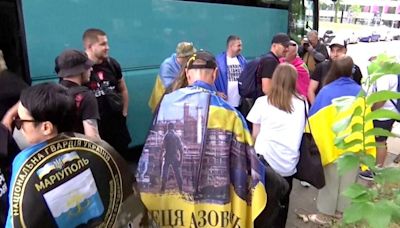 Ukrainian War Veterans Arrive to Support Their National Soccer Team in Germany