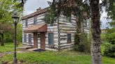 Historic cabin in Dover Township auctioned off, its future uncertain