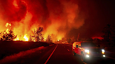 Wildfires ravage US and Canada, burn thousands of square miles, prompt evacuations