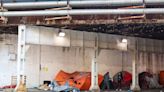Debate over controversial homeless encampment boils over in wake of fatal shooting