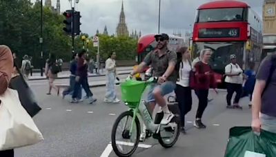 Busy London pedestrian crossing where HALF of cyclists jump red lights